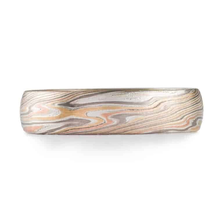 mokume gane twist pattern band with etched finish, red gold yellow gold palladium and silver