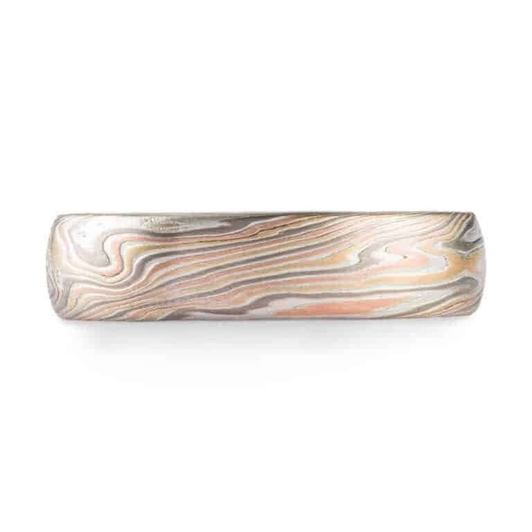 mokume gane twist pattern band with etched finish, red gold yellow gold palladium and silver