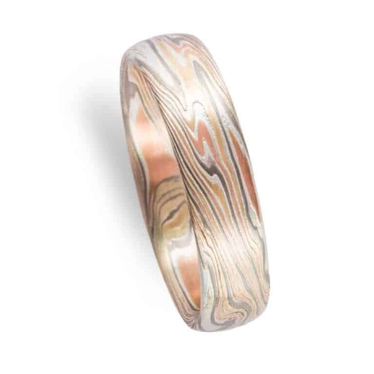 mokume gane twist pattern band with etched finish, red gold yellow gold palladium and silver