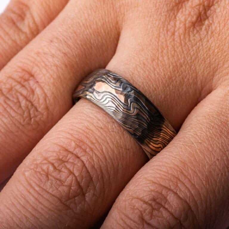 rustic feeling band with hammered finish mokume gane ring