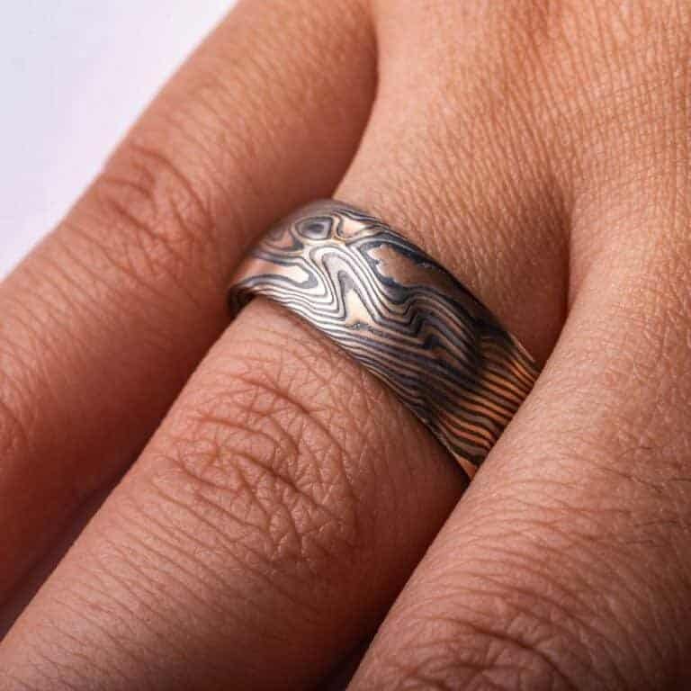 mokume gane large band with multiple golds and metals in twist pattern