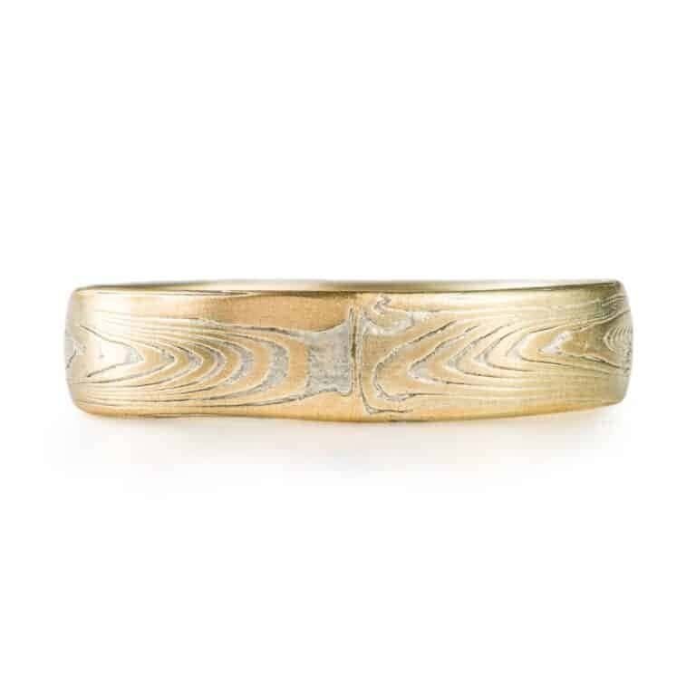 mokume gane wedding ring, gold, patterned in a linear style