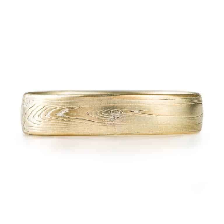 mokume gane wedding ring, gold, patterned in a linear style