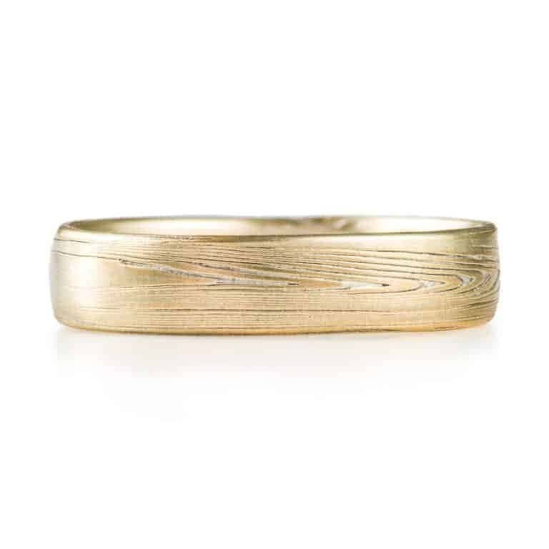 mokume gane wedding ring, gold, patterned in a linear style