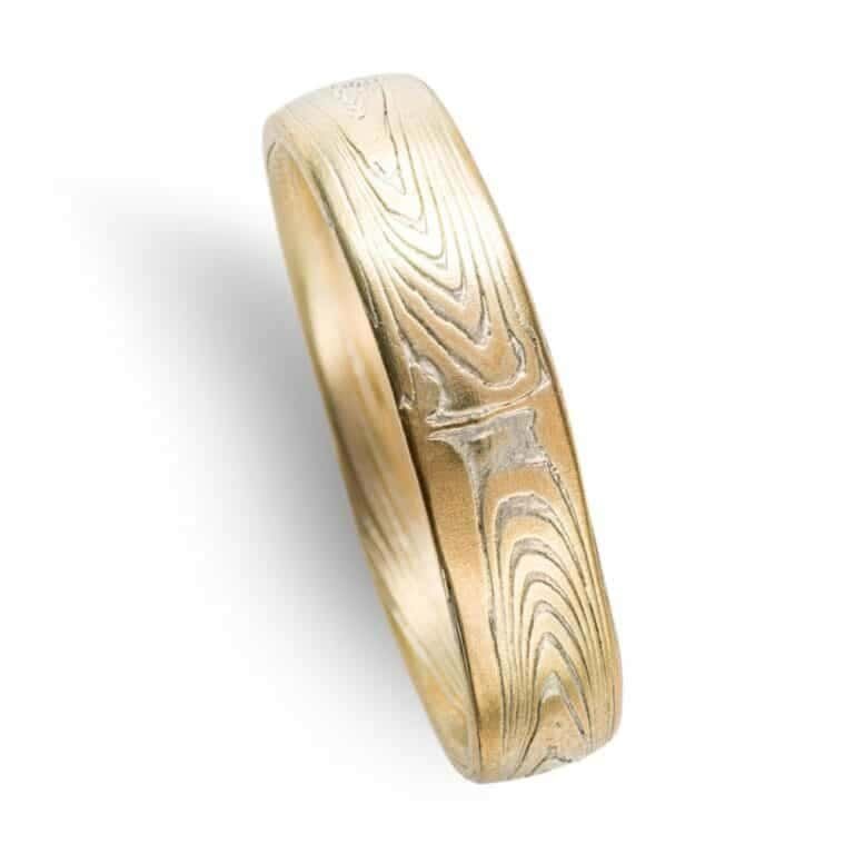 mokume gane wedding ring, gold, patterned in a linear style