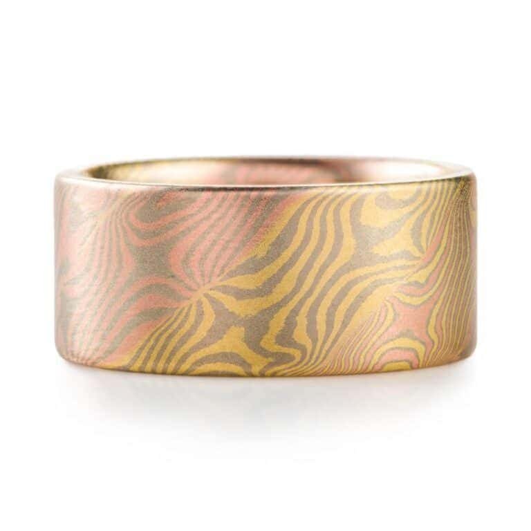 completely custom made mokume gane ring, extra wide multicolored strands individually patterned and then twisted together