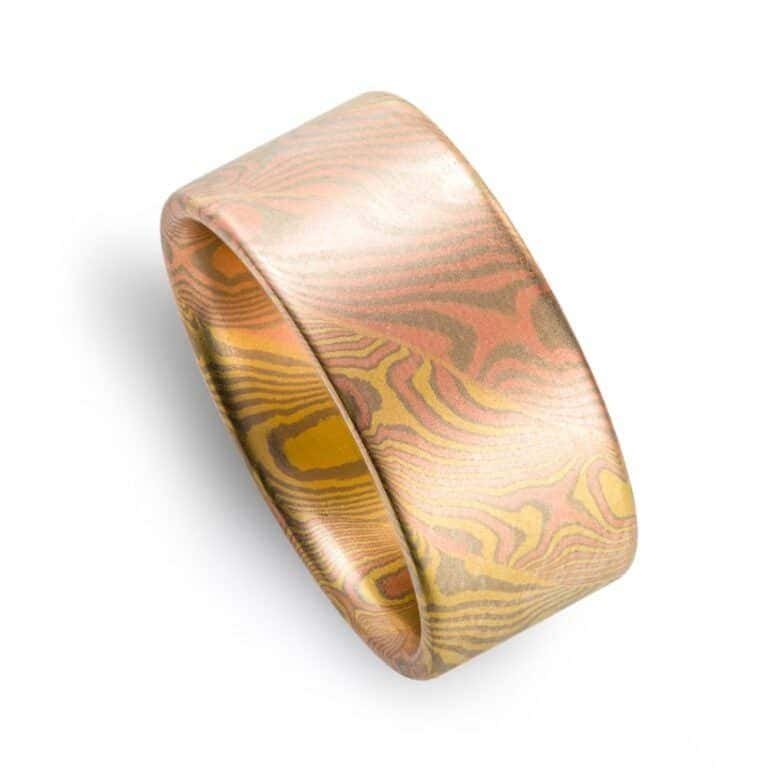 completely custom made mokume gane ring, extra wide multicolored strands individually patterned and then twisted together