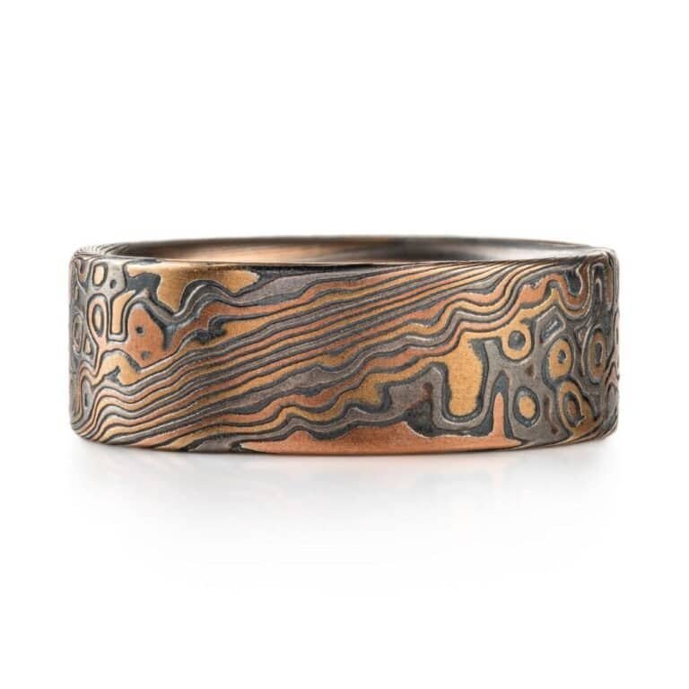 detailed patterned mokume gane band, relatively wide ring, flat profiled, with textured etched finish