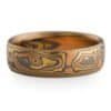 Ring made in mokume gane pattern, with red gold, yellow gold and oxidized silver.