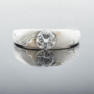 hand_crafted_mokume_gane_engagement_ring_or_ring_in_smoke_palette_and_twist_pattern_with_cathedral_set_diamond1