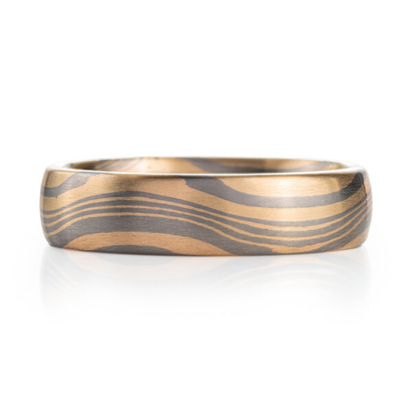 custom made mokume gane patterned ring made with palladium and yellow gold, pattern resembles flowing air or water