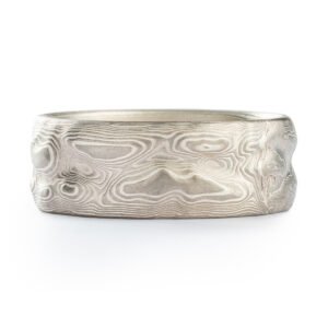 textured mokume gane ring made in Arn Krebs Guri Bori pattern inspired by topography and mountain ranges, made with silver and palladium