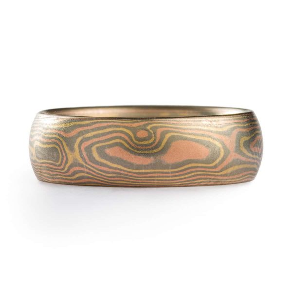 Rustic and elegant Mokume Gane band with woodgrain pattern and Cinders metal combination in low dome and satin finish.