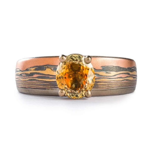 Mokume Gane ring with Fire metal combo, custom landscape design, sapphire, 14k yellow & red gold, sterling silver.