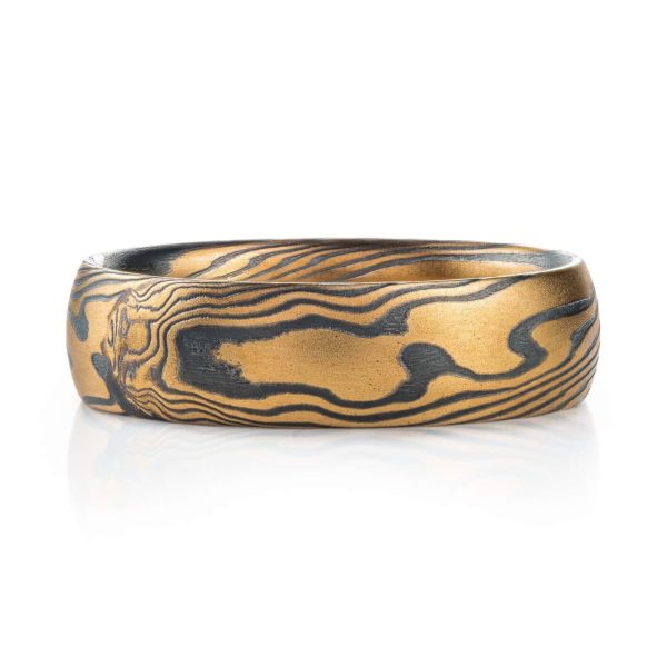 mokume gane twist pattern ring with yellow gold and oxidized silver