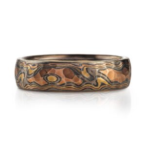 Textured mokume gane ring in Firestorm palette for a rustic feel.