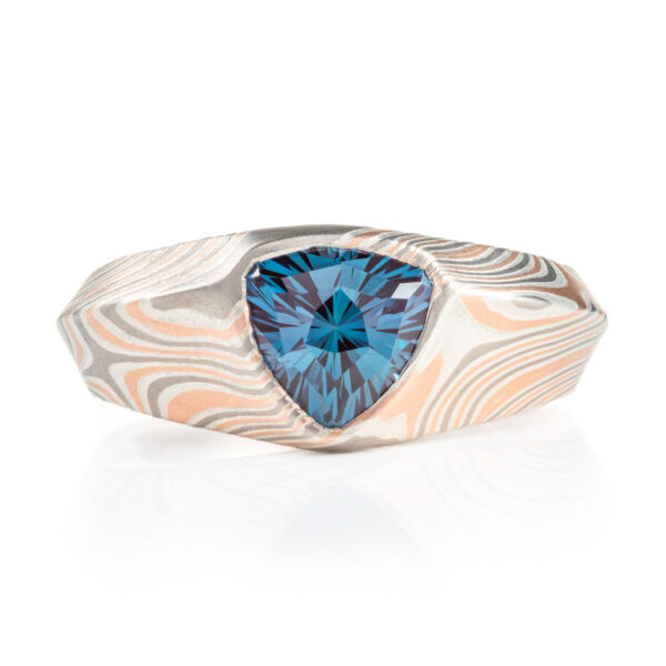 custom made mokume gane ring, wide tapered ring with a beveled edge and large triangular blue stone