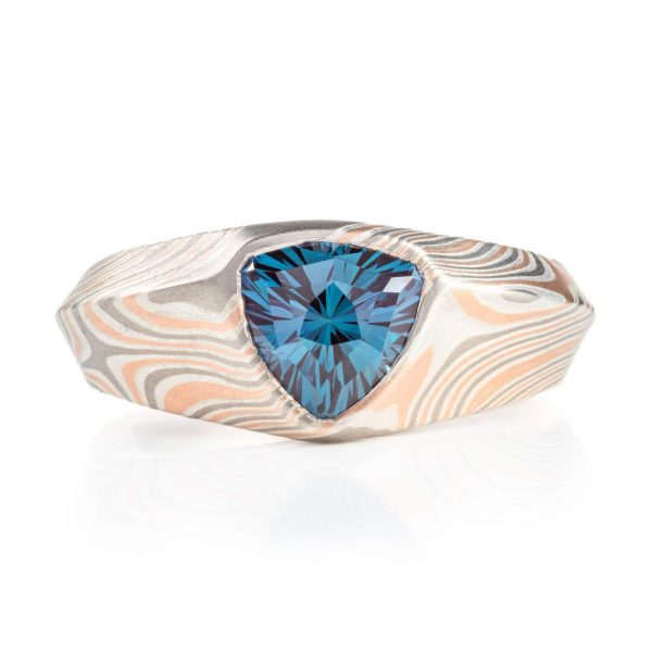 custom made mokume gane ring, wide tapered ring with a beveled edge and large triangular blue stone