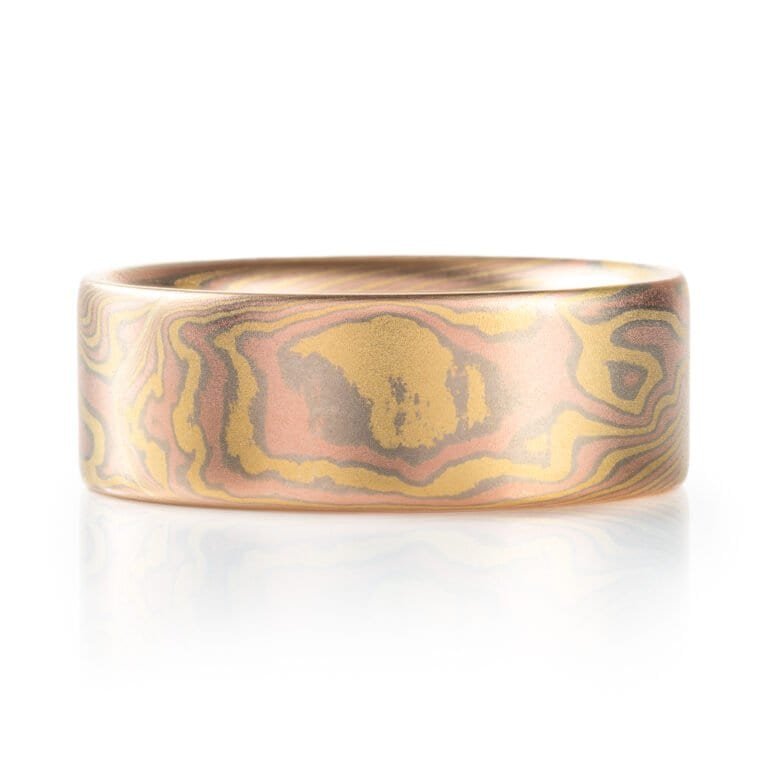 mokume gane all gold ring with flat profile in twist pattern