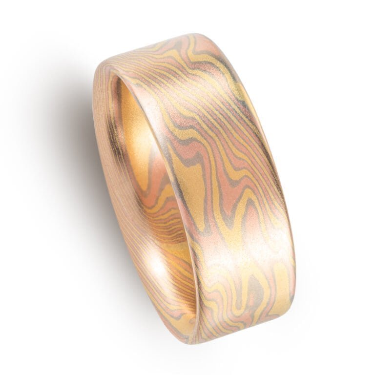 mokume gane all gold ring with flat profile in twist pattern