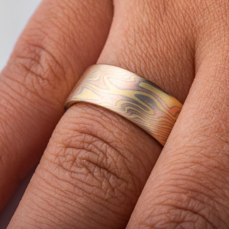 mokume gane all gold ring with flat profile in twist pattern