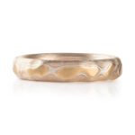 red gold, yellow gold and silver carved mokume ring. hand forged and hand carved. looks like gold islands floating above silver and red lines like a river of metal
