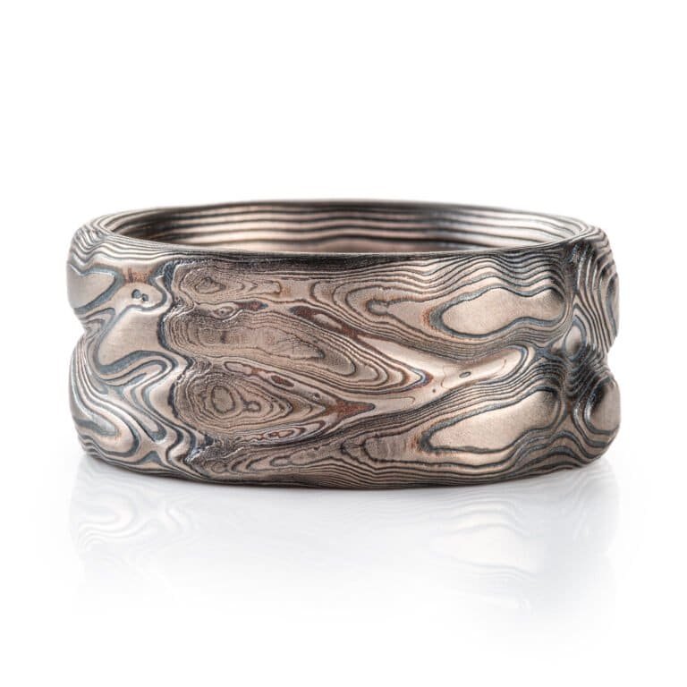 hand carved Mokume Gane ring with silver and palladium. grey and black mokume ring for men