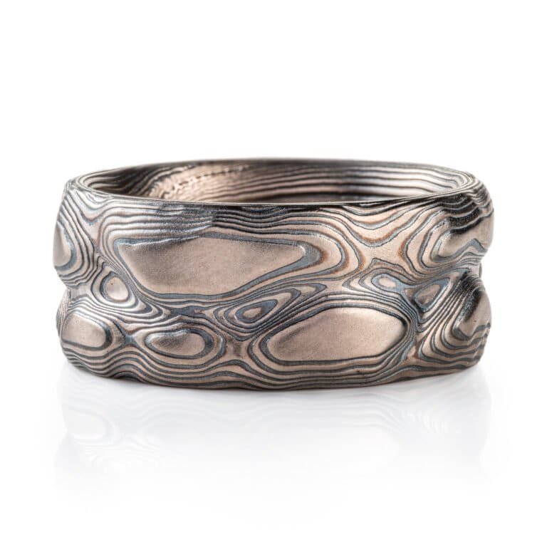 hand carved Mokume Gane ring with silver and palladium. grey and black mokume ring for men