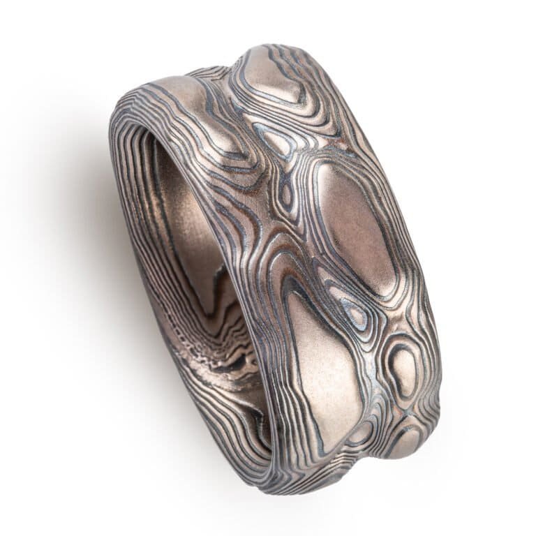 hand carved Mokume Gane ring with silver and palladium. grey and black mokume ring for men