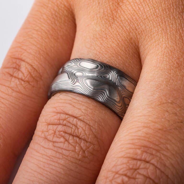 hand carved Mokume Gane ring with silver and palladium. grey and black mokume ring for men