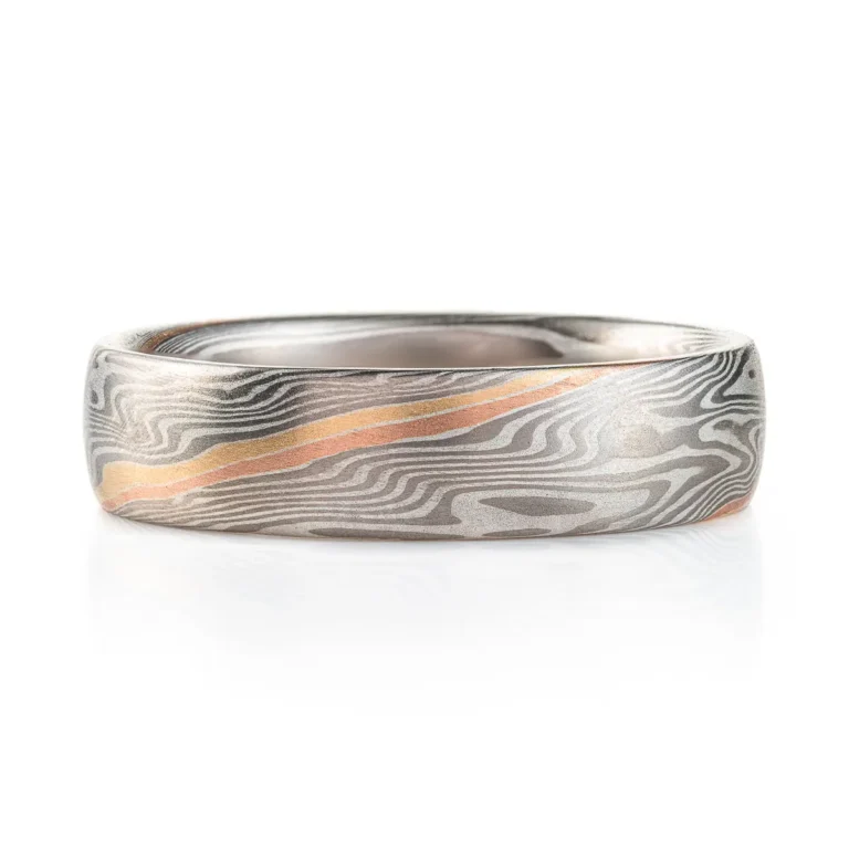 specialty mokume gane band with double stratum accent