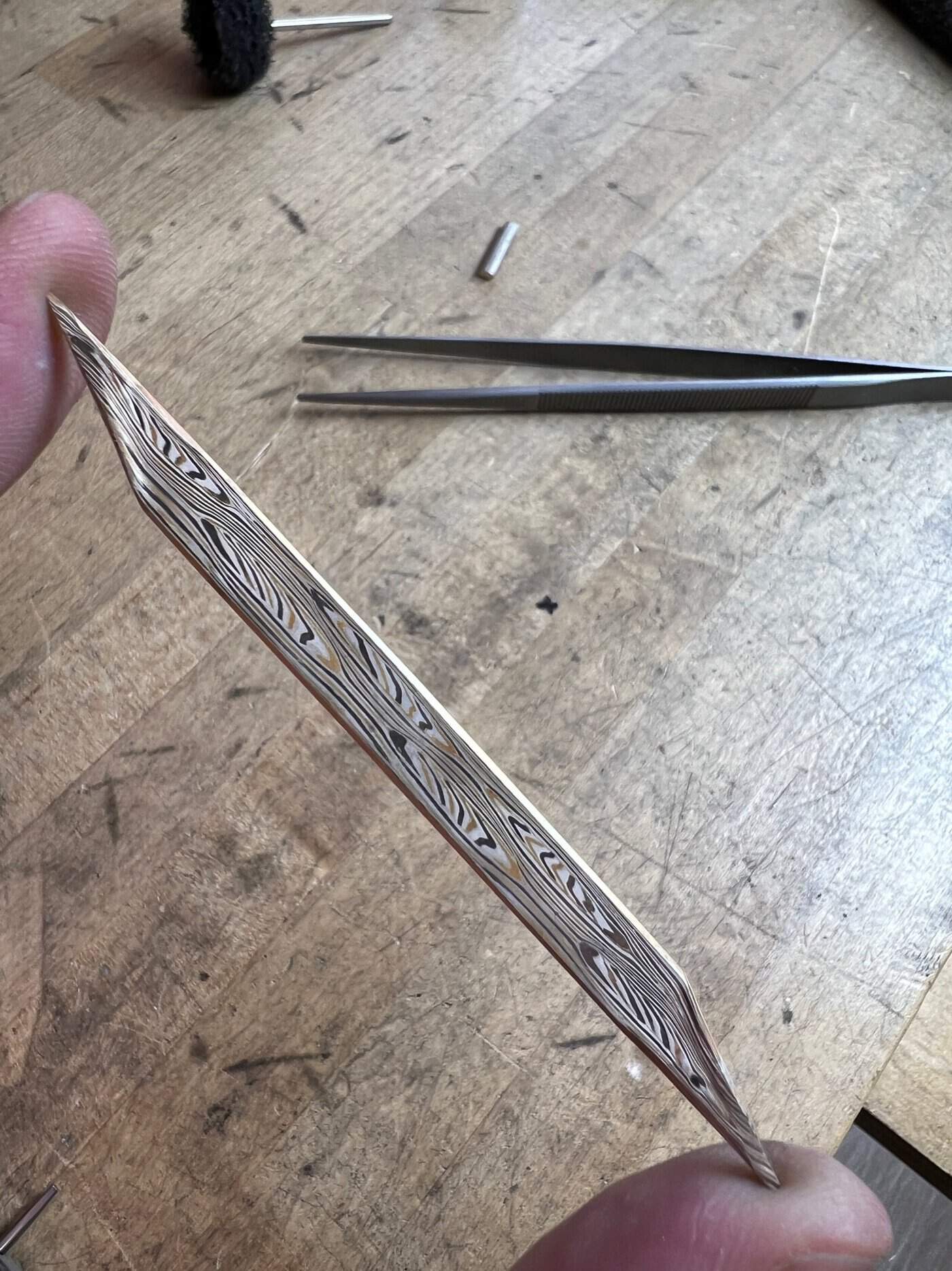 piece of mokume stock flattened out in preparation to create a ring