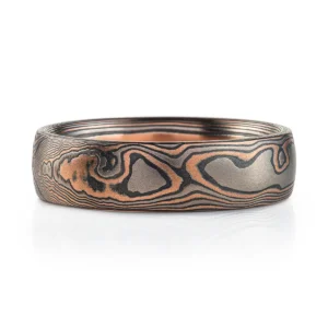 woodgrain patterned mokume gane ring with red gold, palladium and oxidized silver