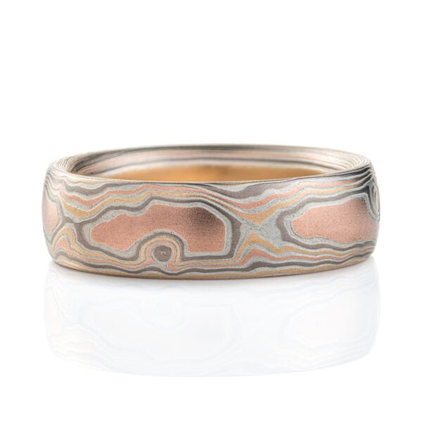 Light feeling men's mokume gane ring made to look like wood grain, made with red gold, yellow gold, palladium and etched silver.